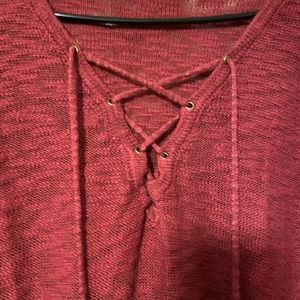 Maurice’s marked long sleeve sweater with lace up neckline. Maurice’s size 3.